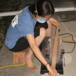 Sanding down the belly using the belt sander